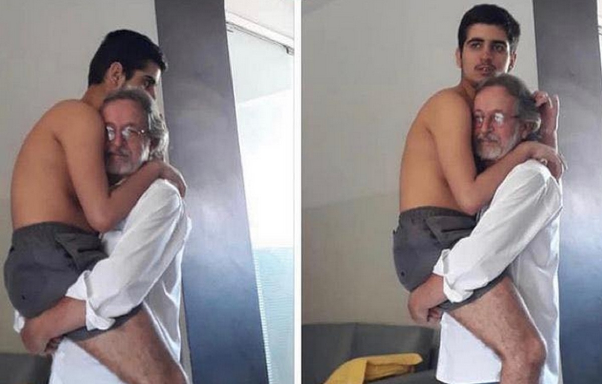 Un grand-p�re porte son petit-fils autiste sur son dos m�me s'il est �g� de 17 ans